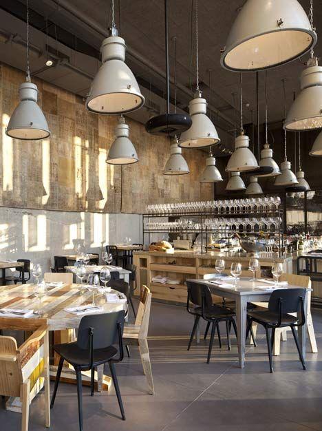 Industrial pendant lighting installed in a contemporary hospitality interior.