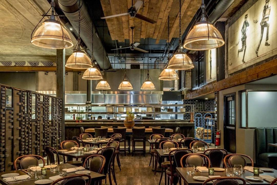 Industrial pendant lighting installed in a contemporary hospitality interior.