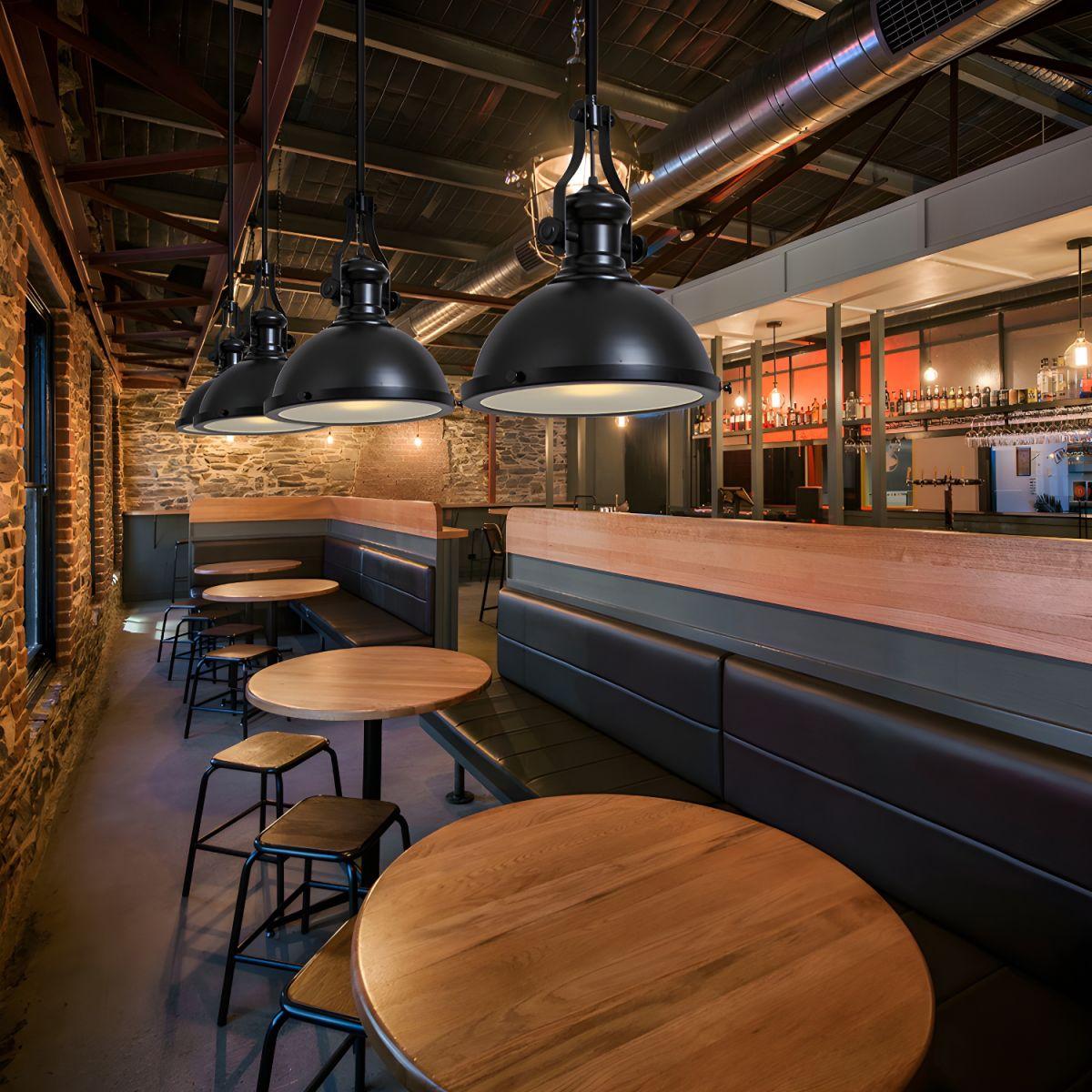 Industrial pendant lighting installed in a contemporary hospitality interior.