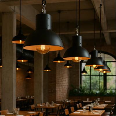 Industrial pendant lighting installed in a contemporary hospitality interior.
