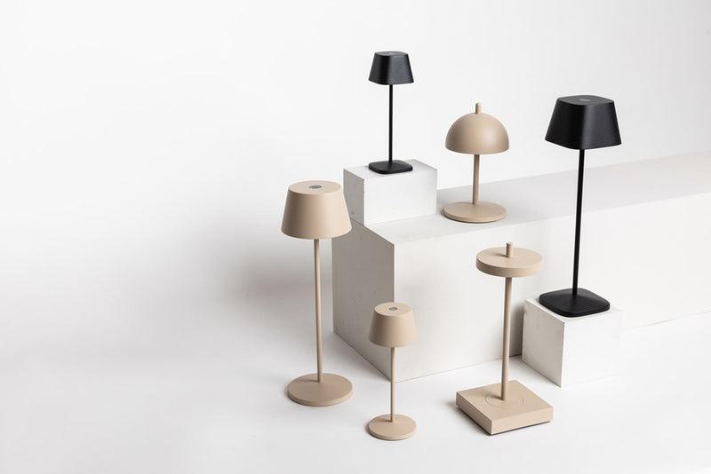 Collection of minimalist table lamps featuring contemporary forms and premium decorative finishes.