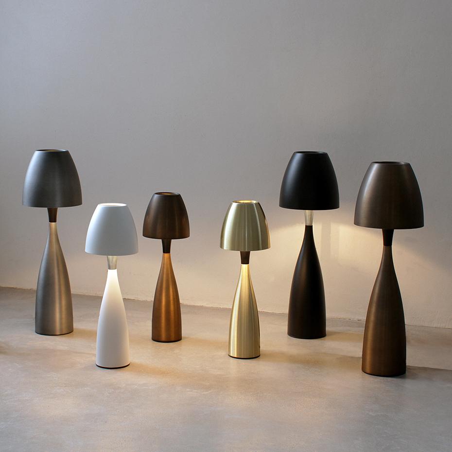 Collection of minimalist table lamps featuring contemporary forms and premium decorative finishes.
