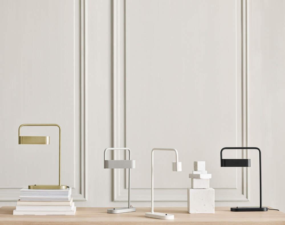 Collection of minimalist table lamps featuring contemporary forms and premium decorative finishes.
