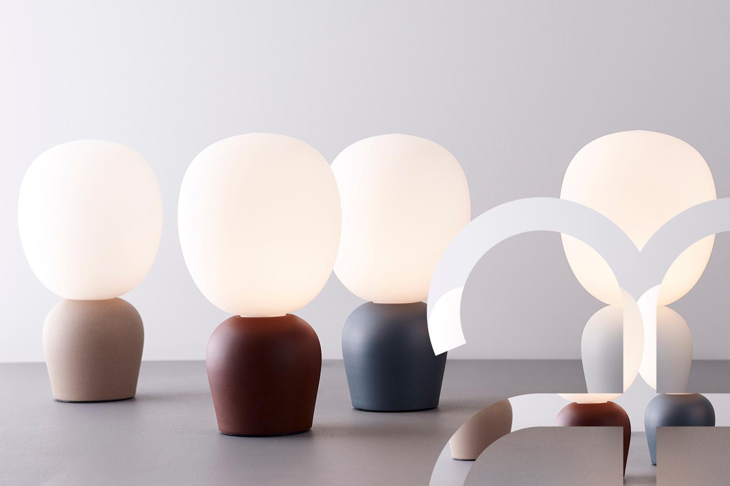 Collection of minimalist table lamps featuring contemporary forms and premium decorative finishes.