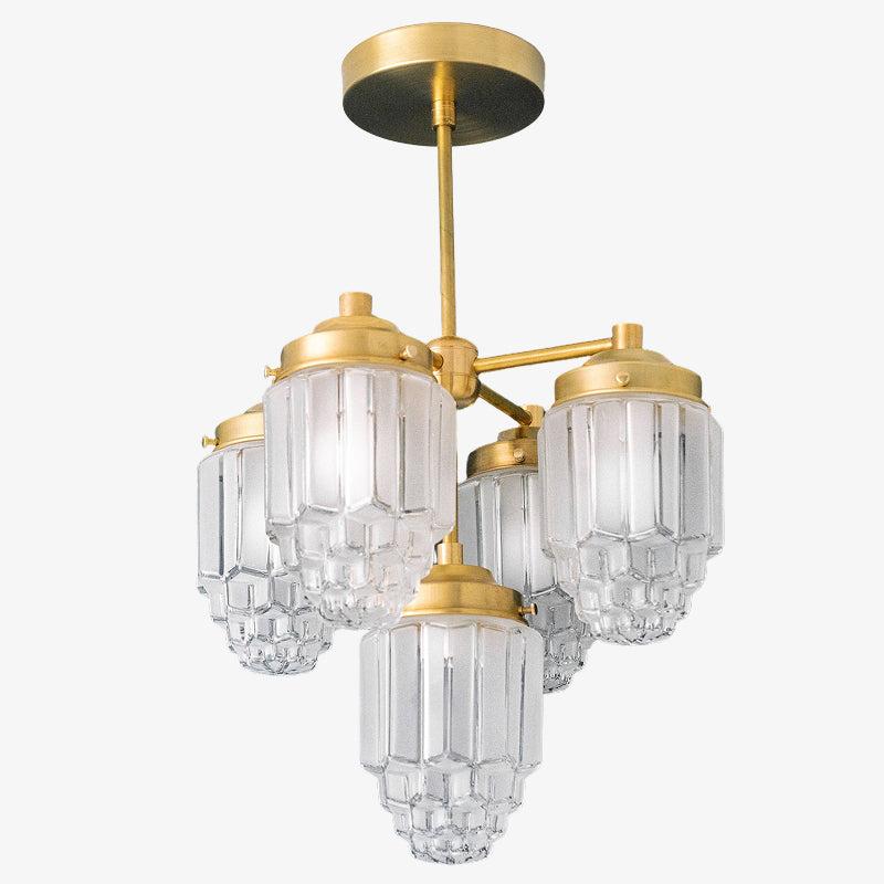 Front view of an elegant Art Deco chandelier with geometric detailing.