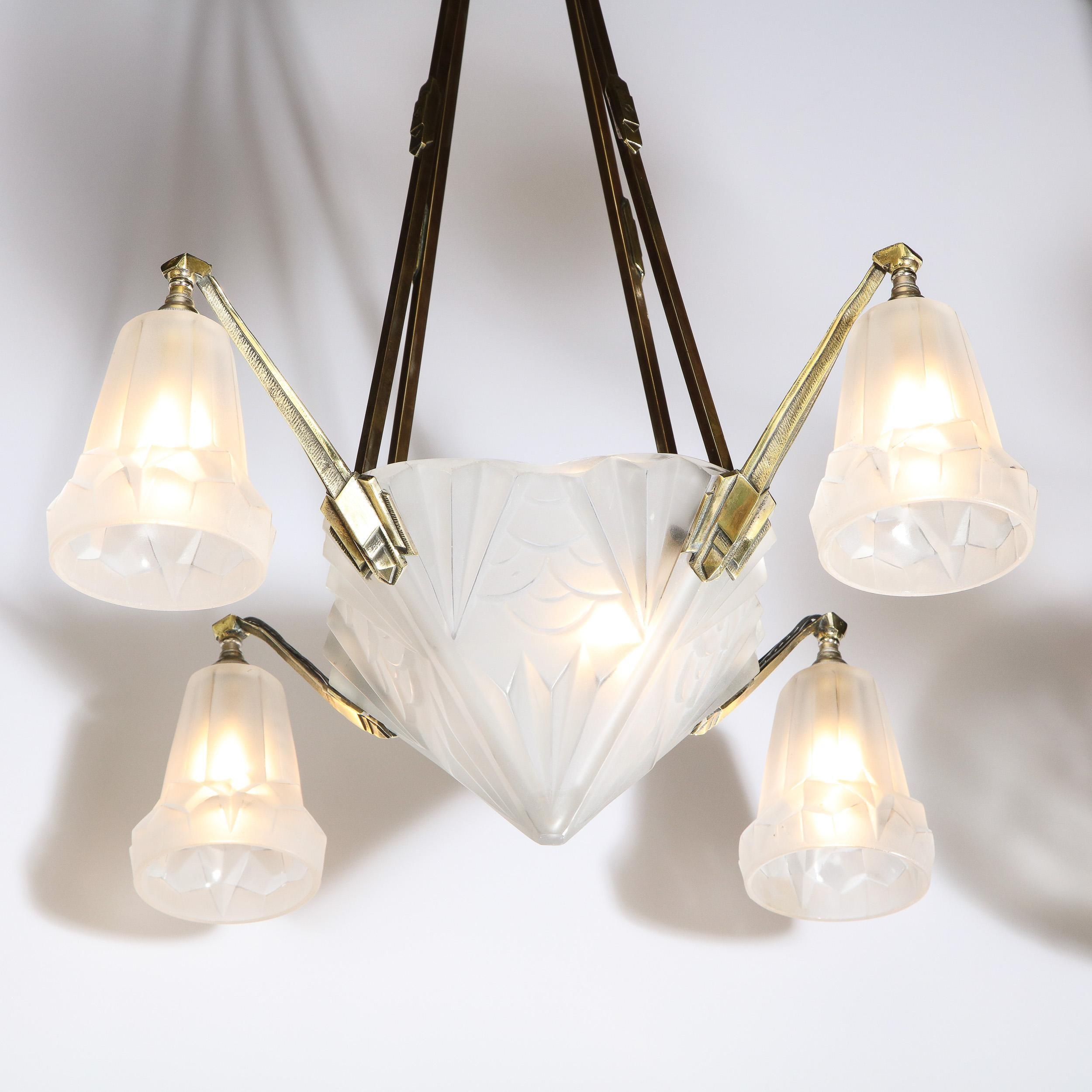 Front view of an elegant Art Deco chandelier with geometric detailing.