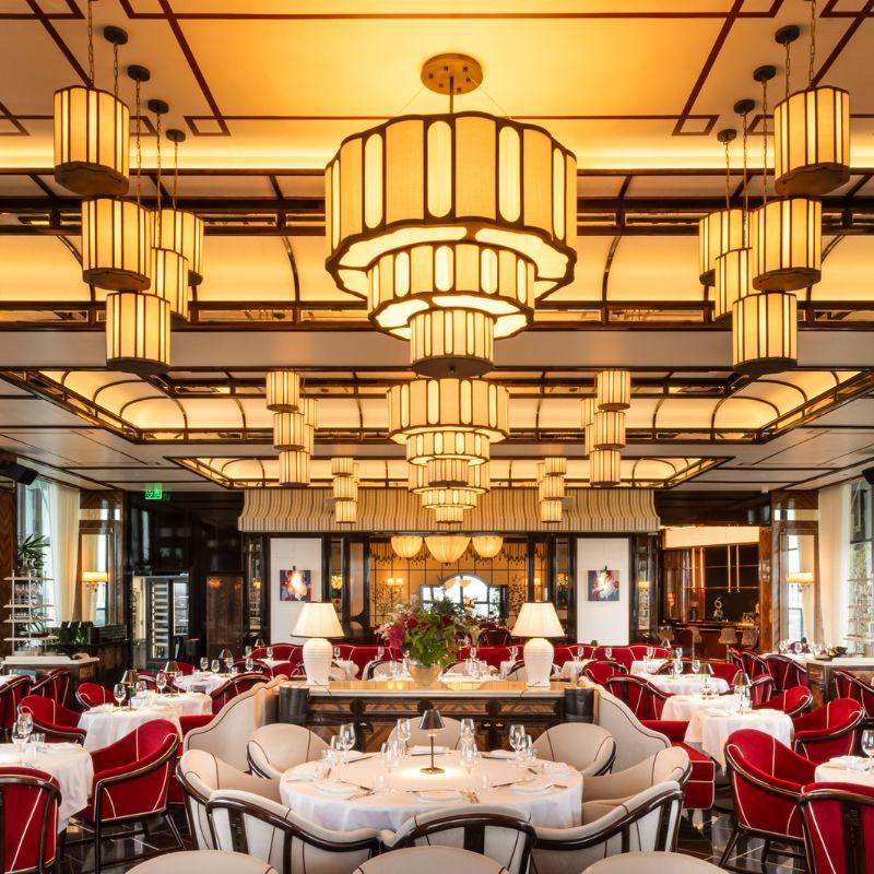 Art Deco chandelier installed in a luxury hospitality interior.