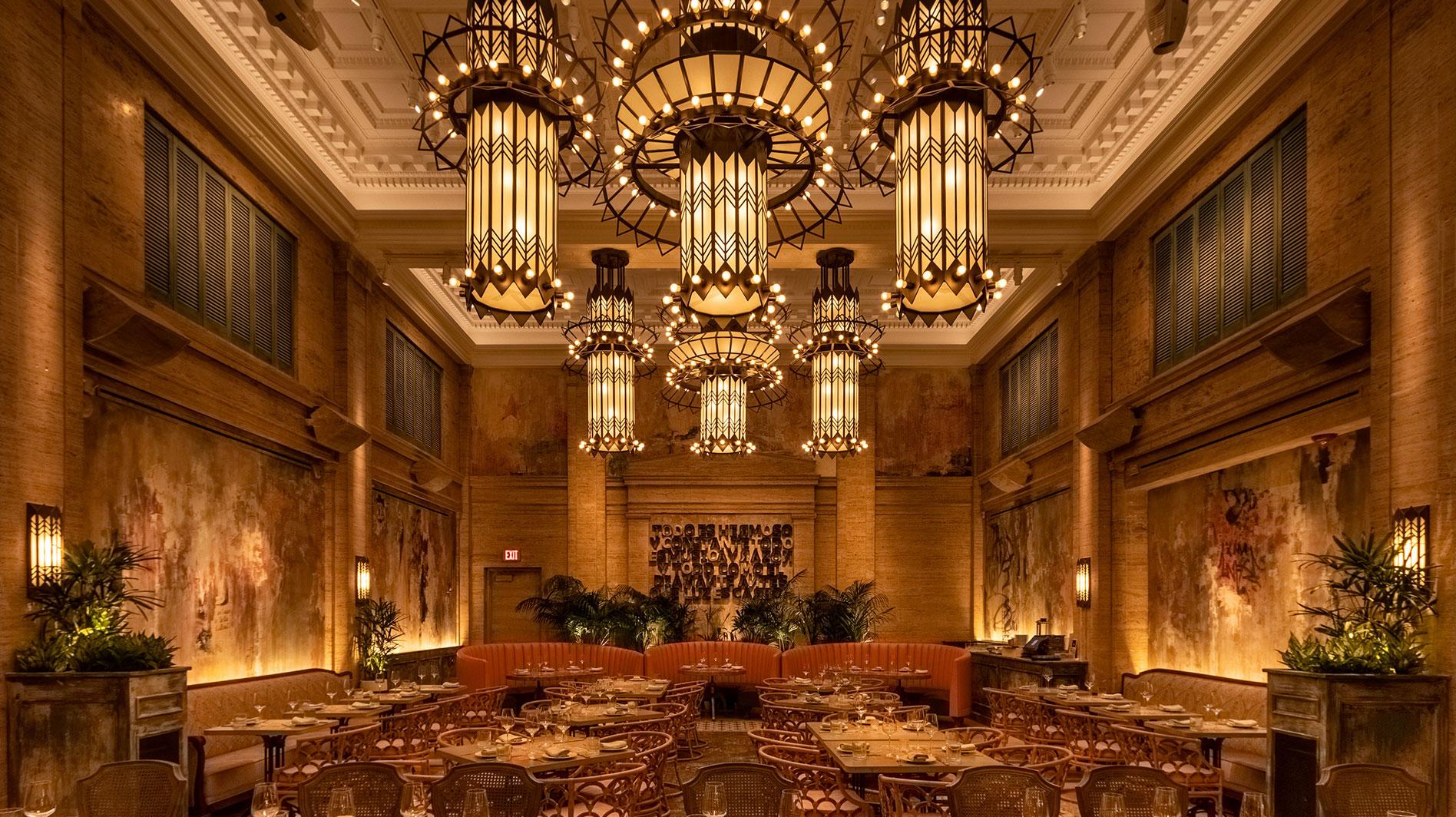 Art Deco chandelier installed in a luxury hospitality interior.