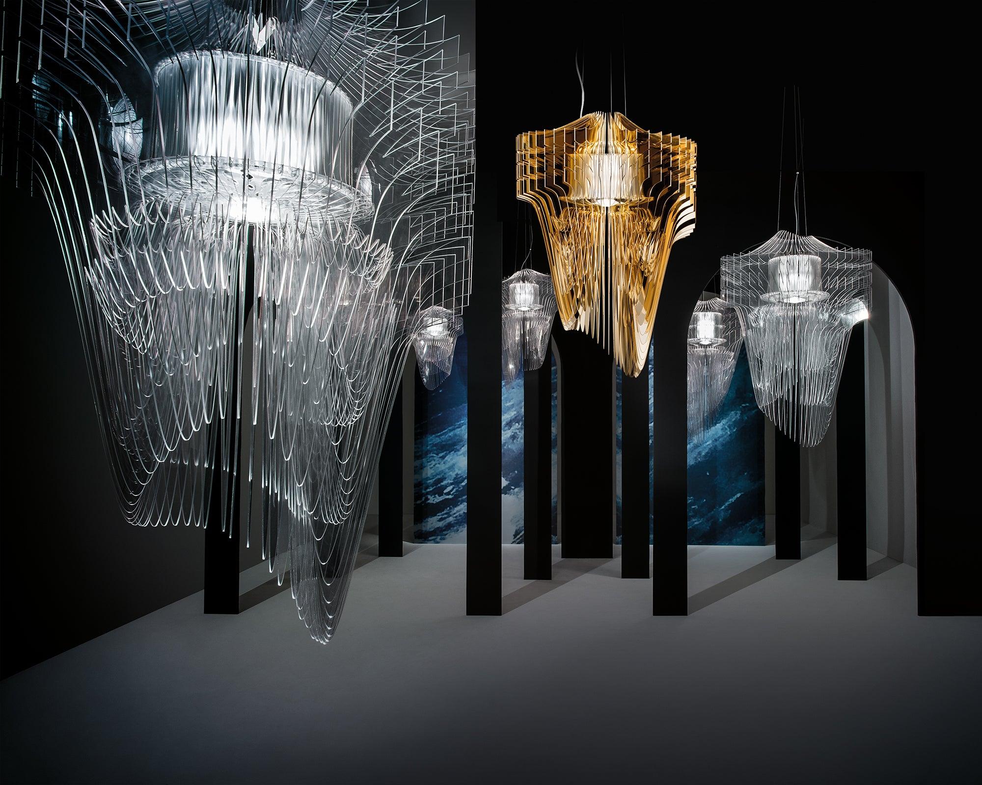 Sculptural chandelier family featuring multiple artistic compositions and sizes.