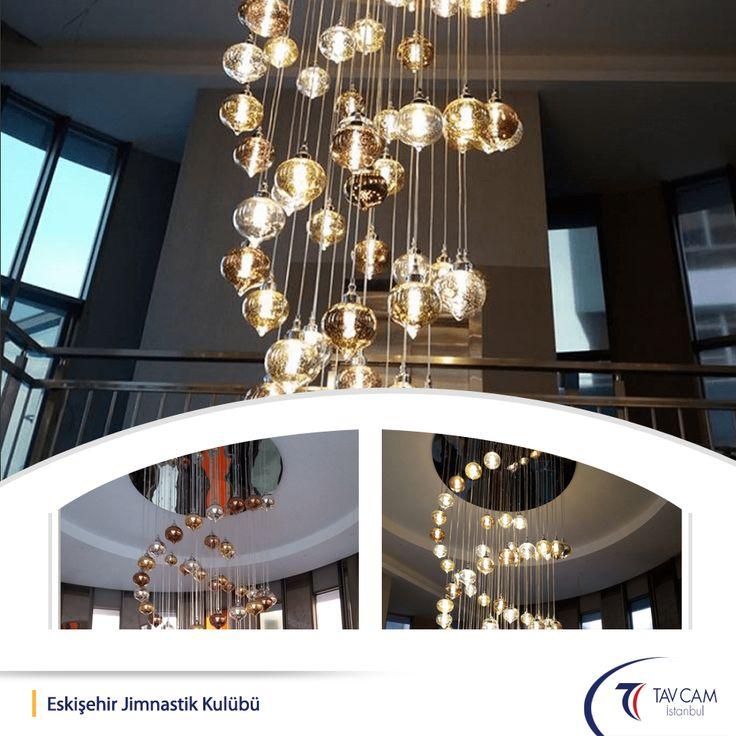 Sculptural chandelier installed in a contemporary hospitality or cultural interior.