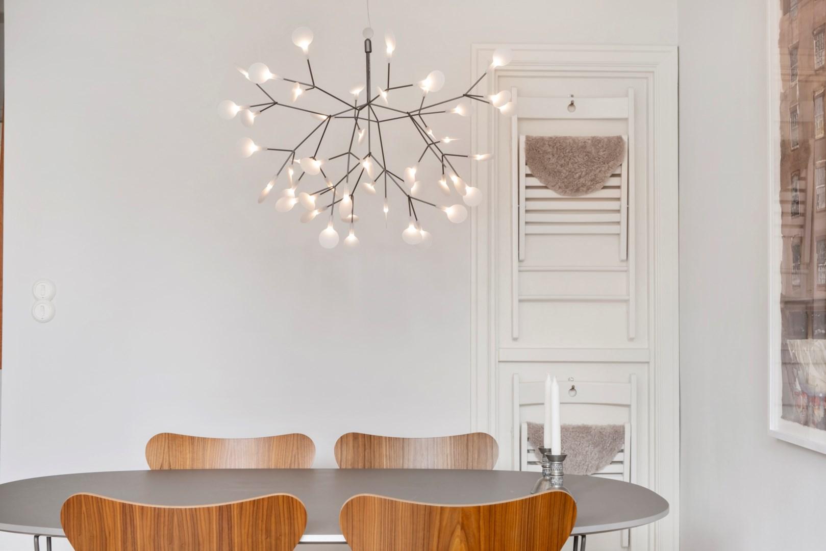 Front view of a Nordic-inspired chandelier with clean architectural lines.