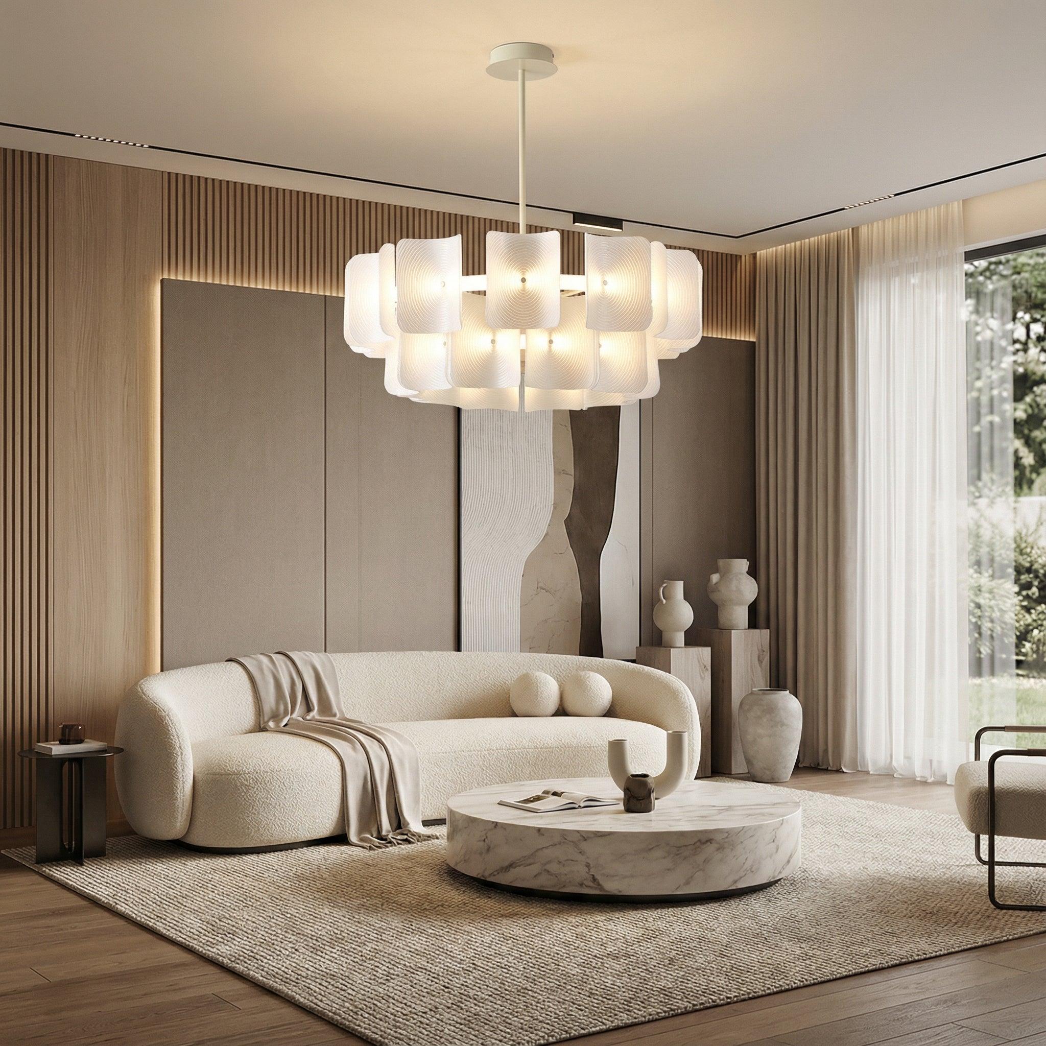 Scandinavian chandelier installed above a contemporary dining area in a modern residential interior.