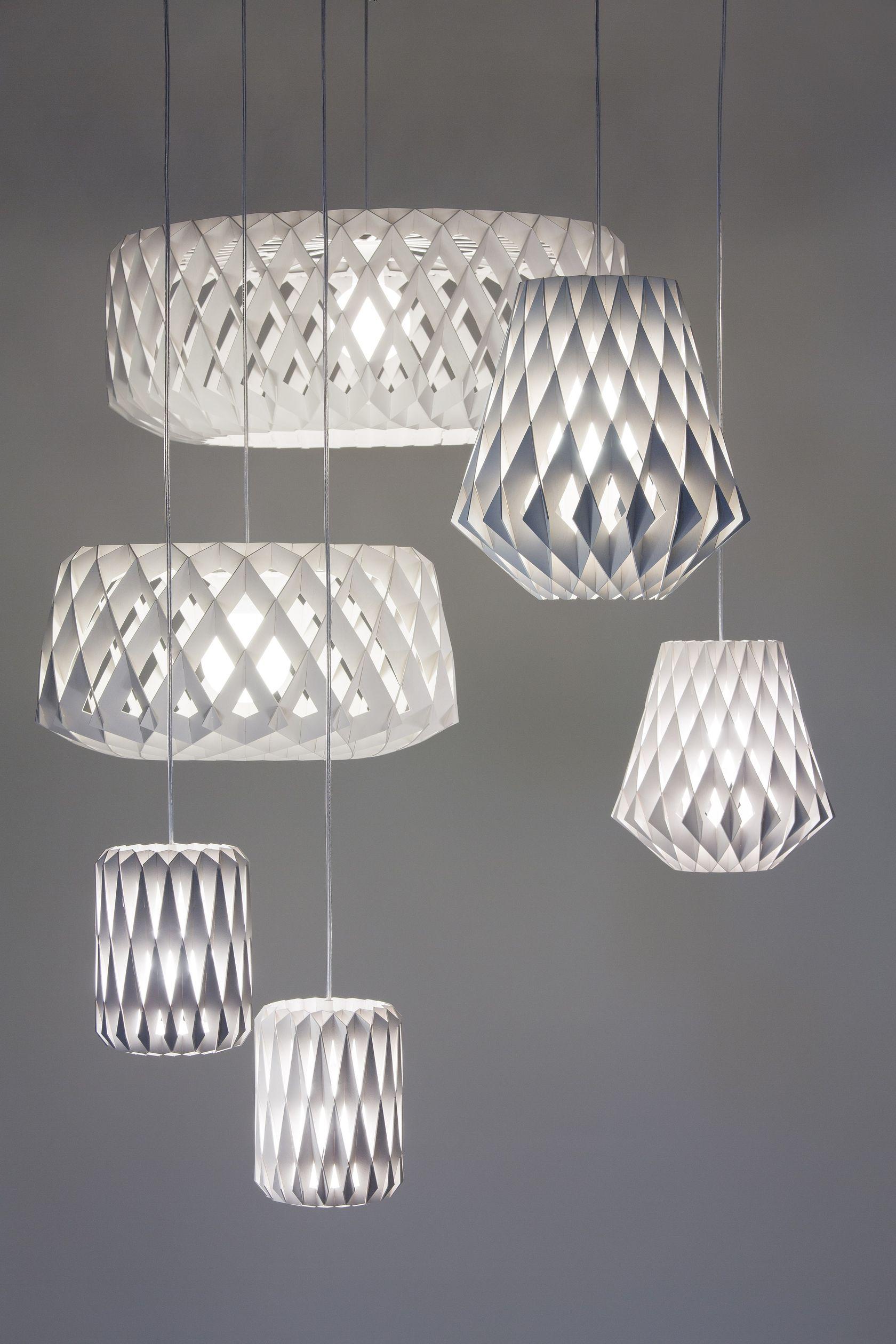 Scandinavian chandelier family featuring multiple sizes and finishes.