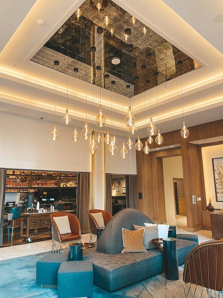 Luxury pendant lighting installed in an upscale hospitality interior.