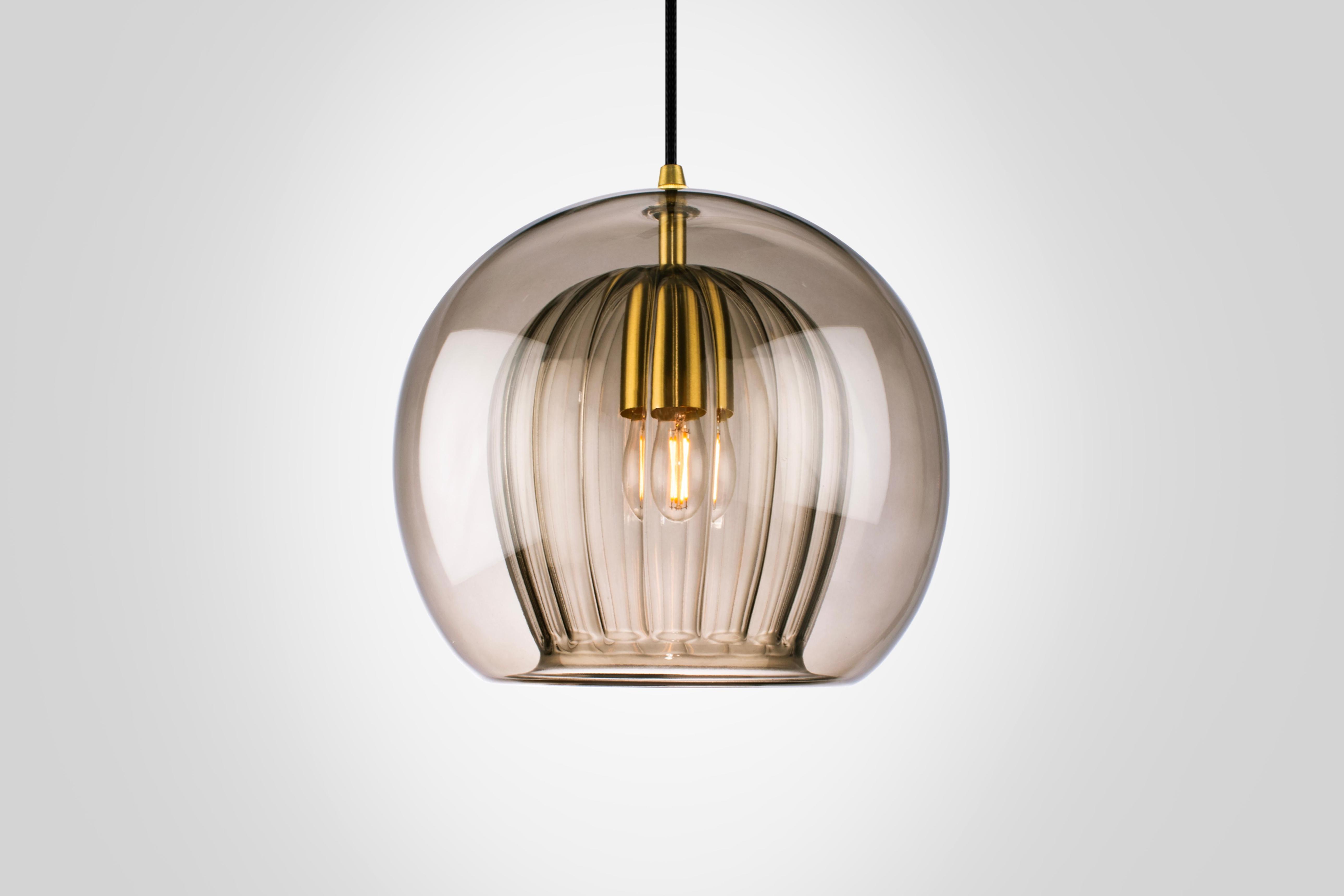 Front view of a luxury pendant light for contemporary architectural interiors.