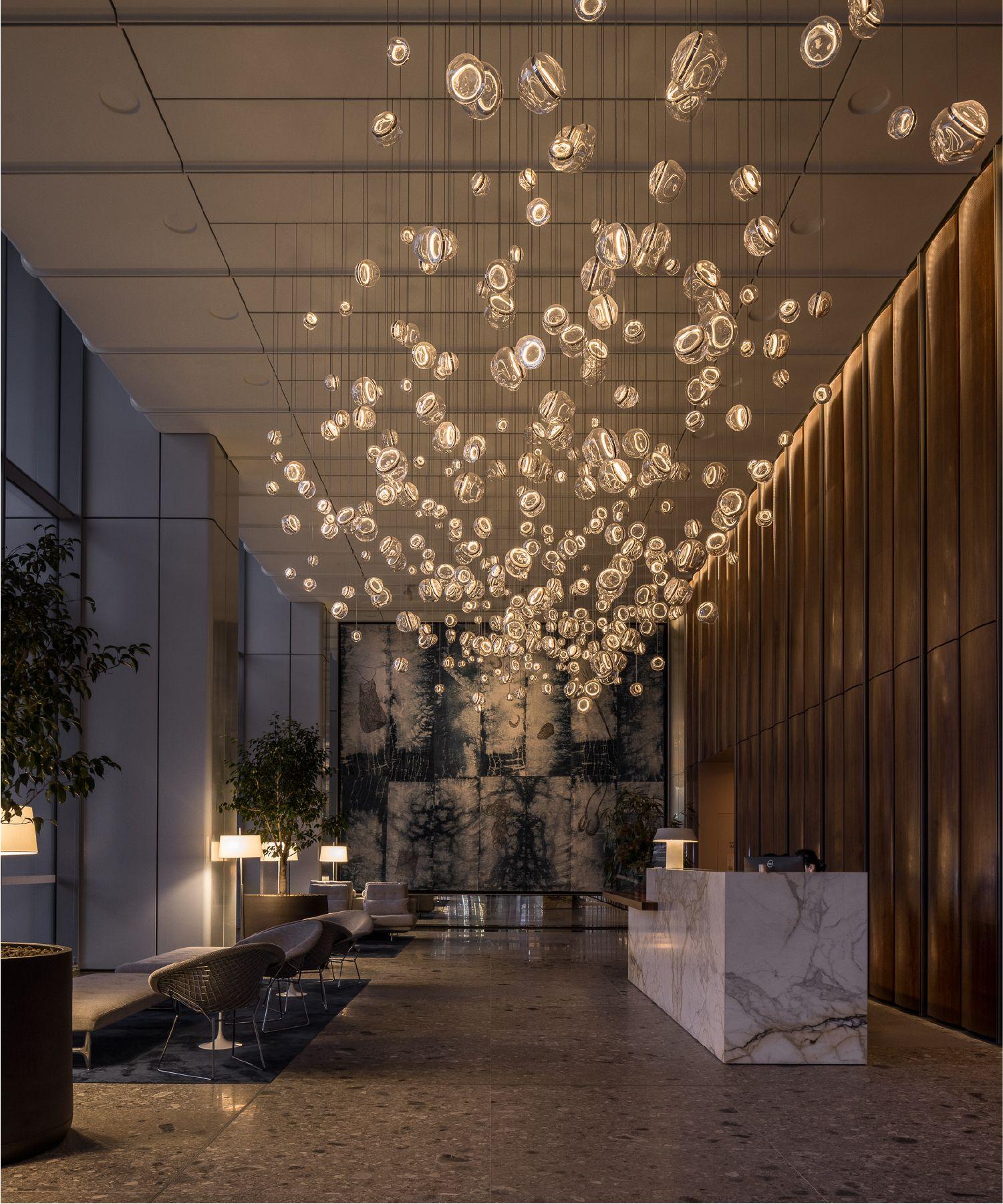 Luxury pendant lighting installed in an upscale hospitality interior.