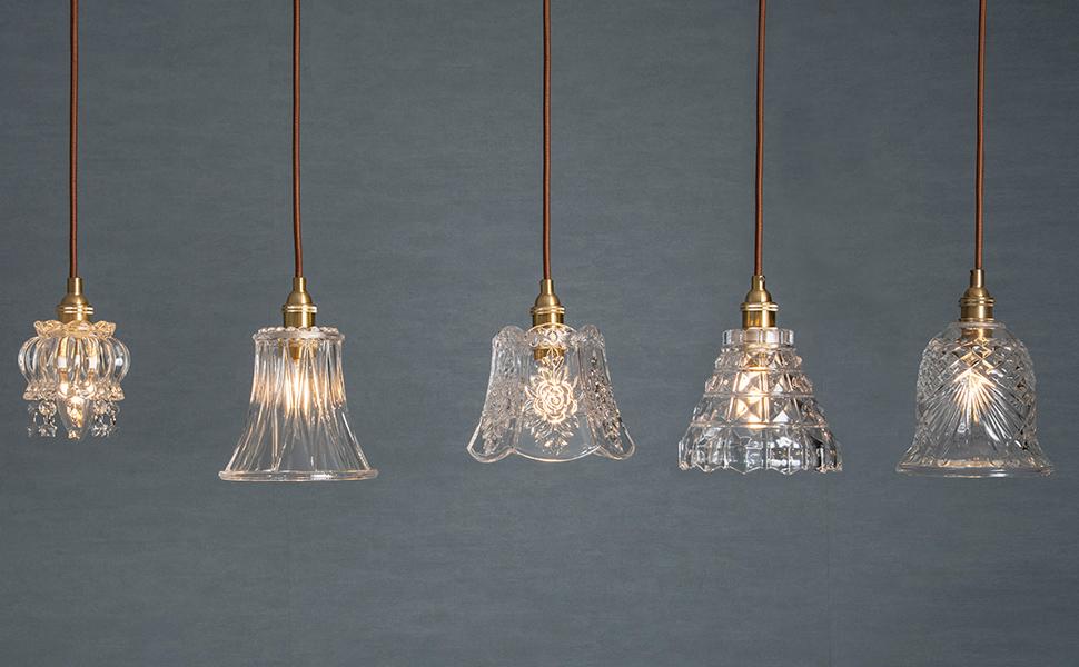 Luxury pendant lighting family featuring multiple sizes and design variations.