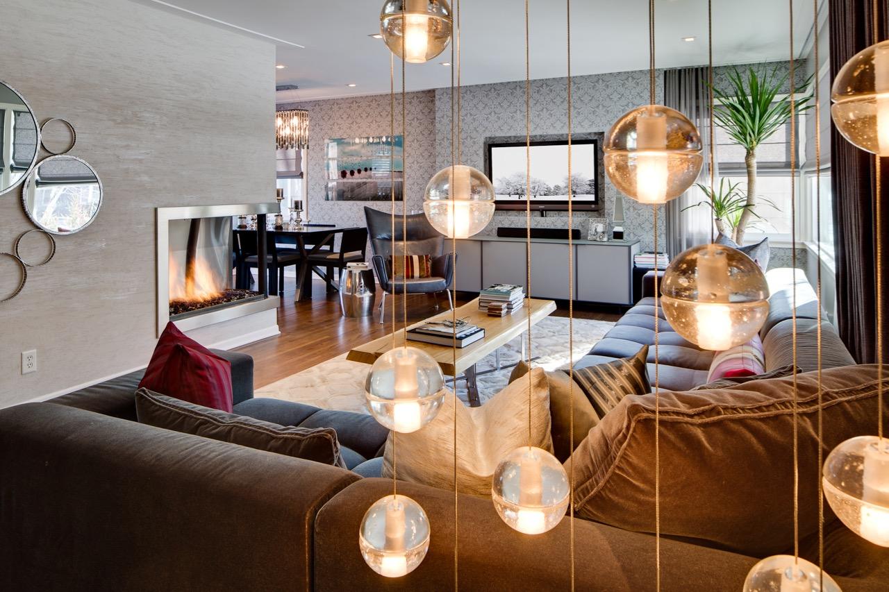 Luxury pendant lighting installed in an upscale hospitality interior.