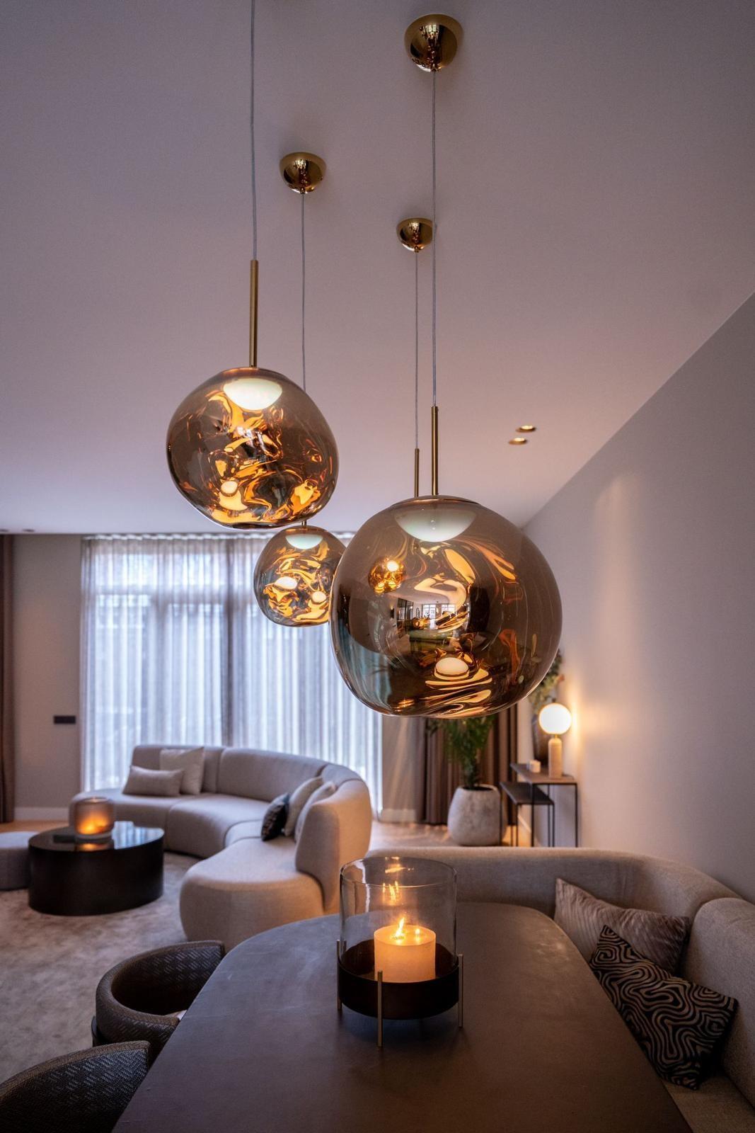 Luxury pendant lighting installed in an upscale hospitality interior.