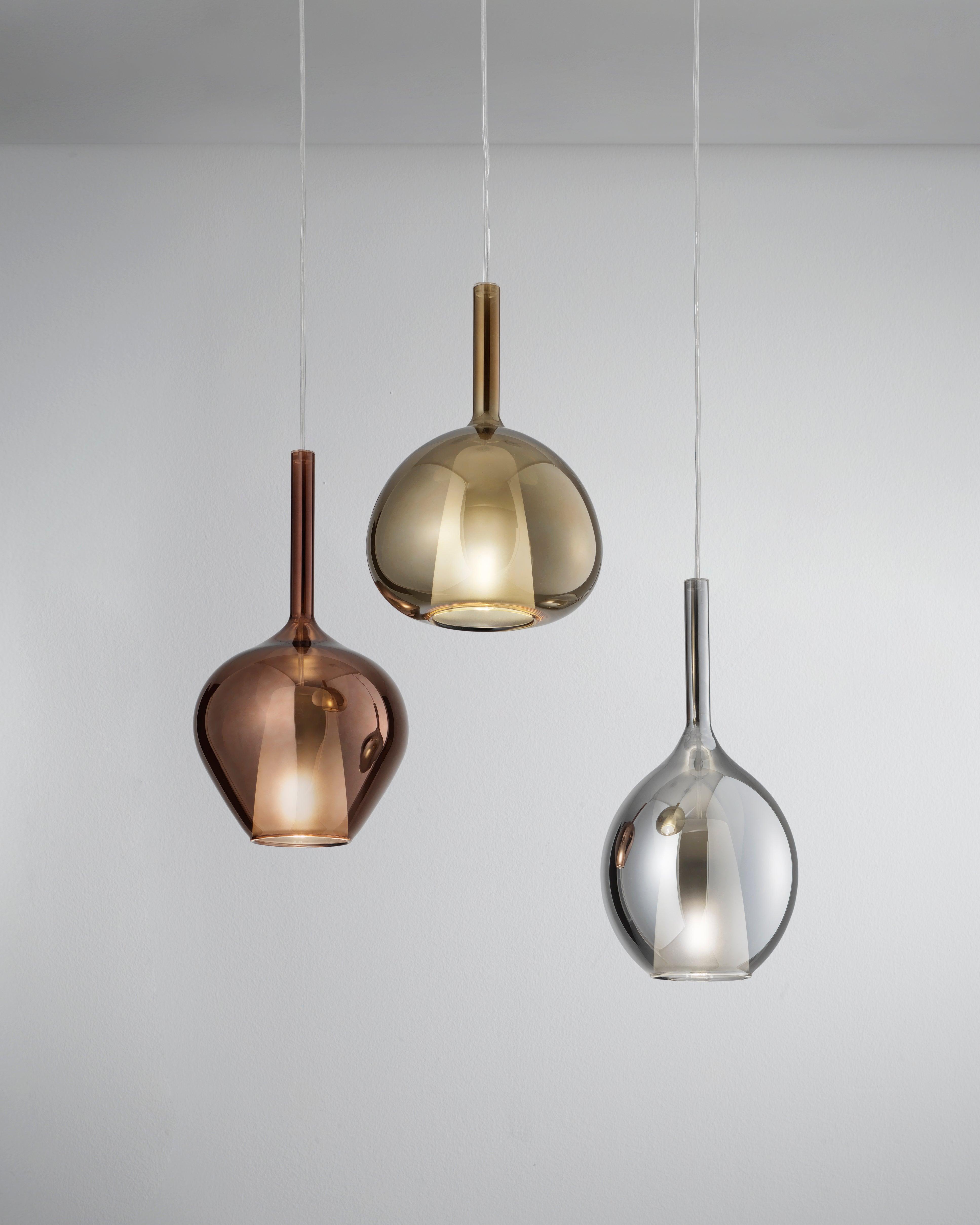 Luxury pendant lighting family featuring multiple sizes and design variations.