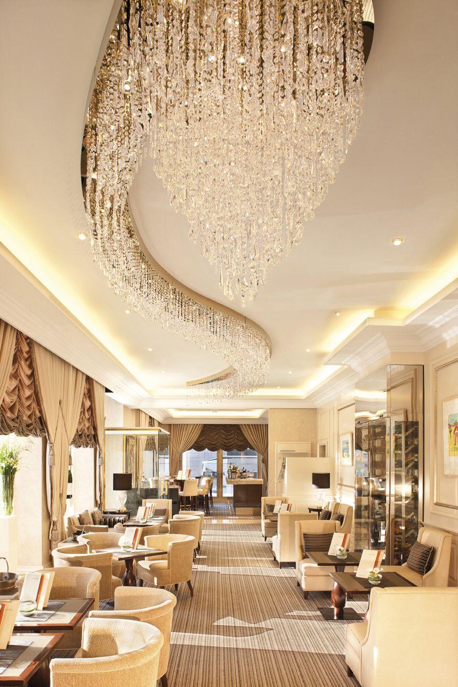 Luxury chandelier installed in a five-star hotel lobby.