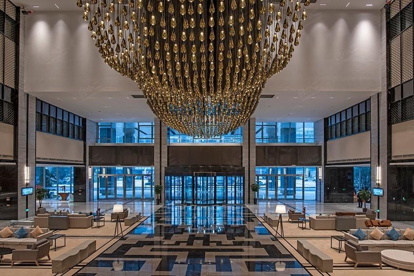 Luxury chandelier installed in a five-star hotel lobby.