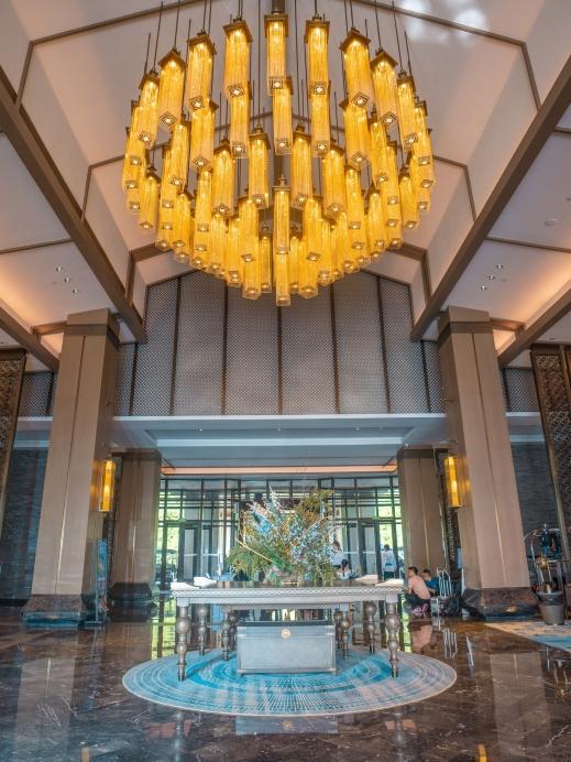 Luxury chandelier installed in a five-star hotel lobby.