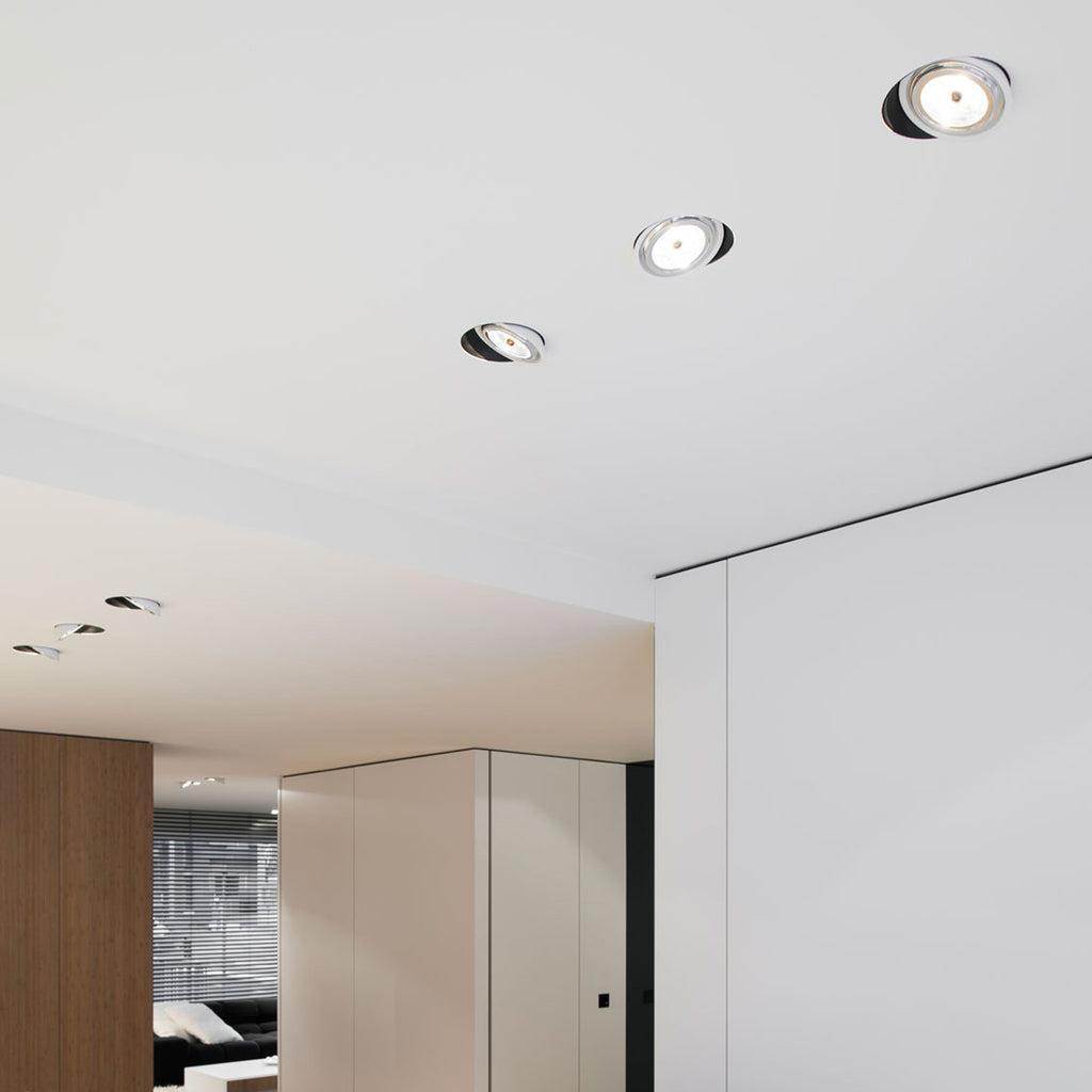 Invisible trimless downlights installed in a contemporary hospitality interior with seamless ceiling integration.