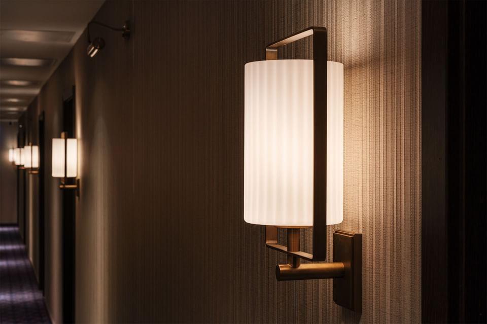 Front view of a custom-designed wall lamp created for a unique architectural project.