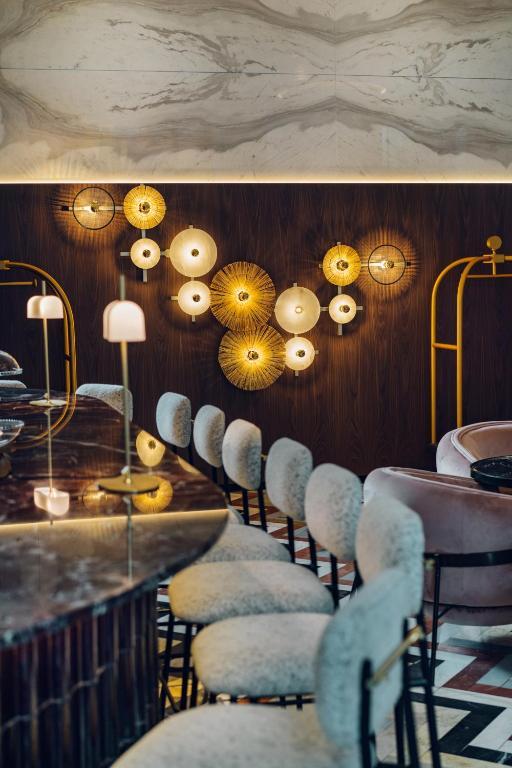Bespoke wall lighting collection showcasing a variety of project-specific decorative designs.