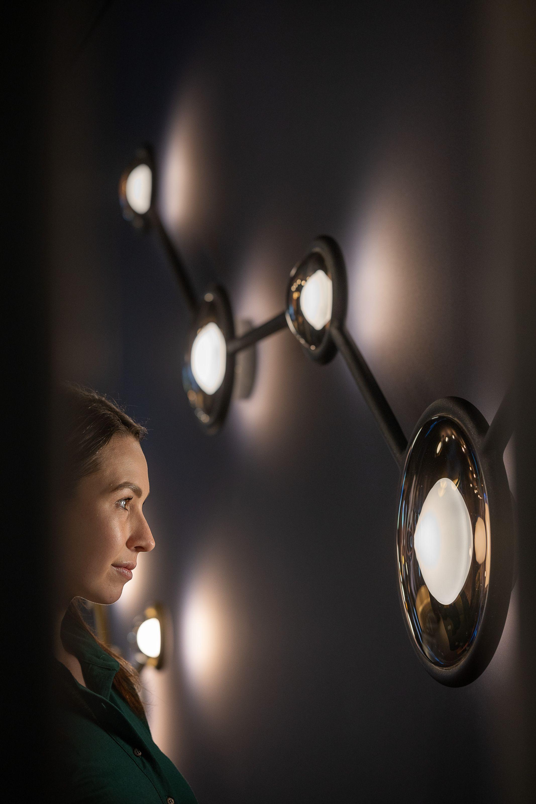 Bespoke wall lighting collection showcasing a variety of project-specific decorative designs.