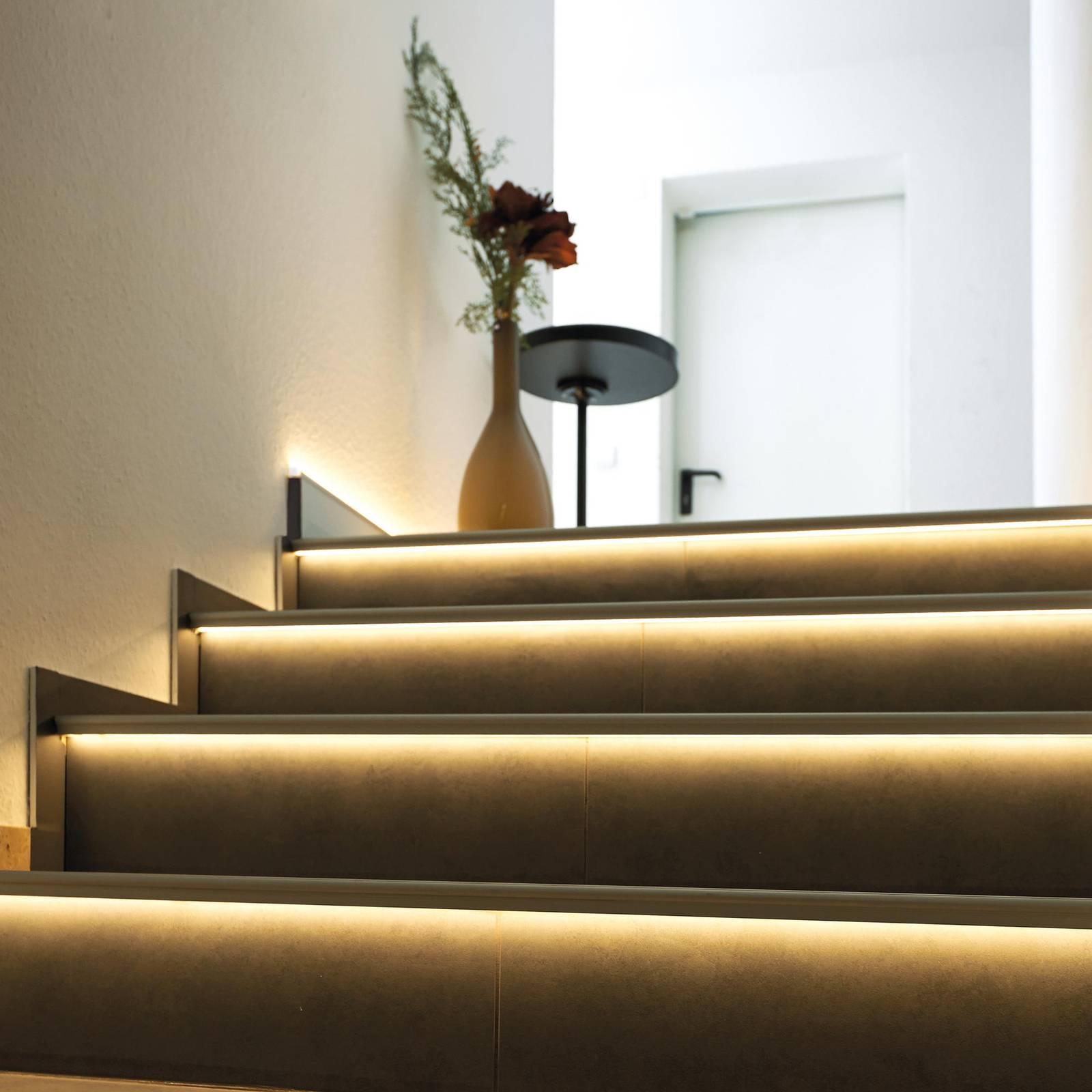 Stair LED profiles integrated into a contemporary architectural staircase.
