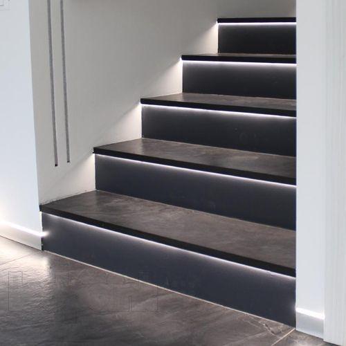 Stair LED profiles integrated into a contemporary architectural staircase.