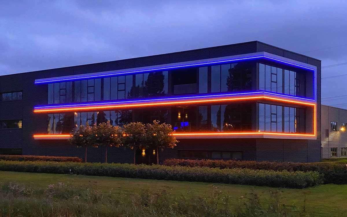 LED Neon Flex creating continuous architectural lighting on a contemporary façade and landscape project.