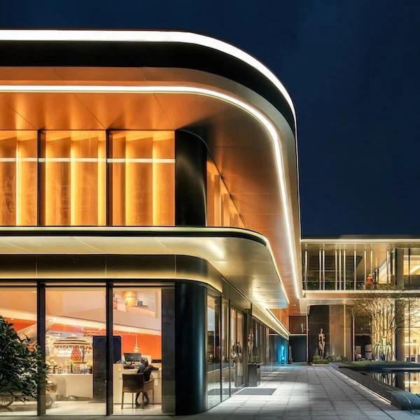 LED Neon Flex creating continuous architectural lighting on a contemporary façade and landscape project.