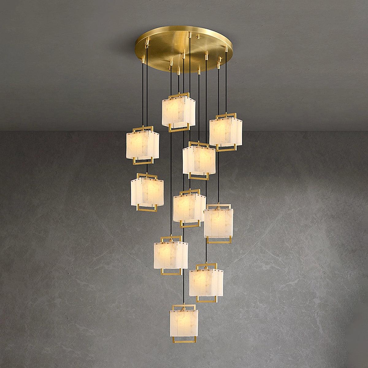 Front view of a luxury marble chandelier highlighting the natural veining and elegant architectural design.