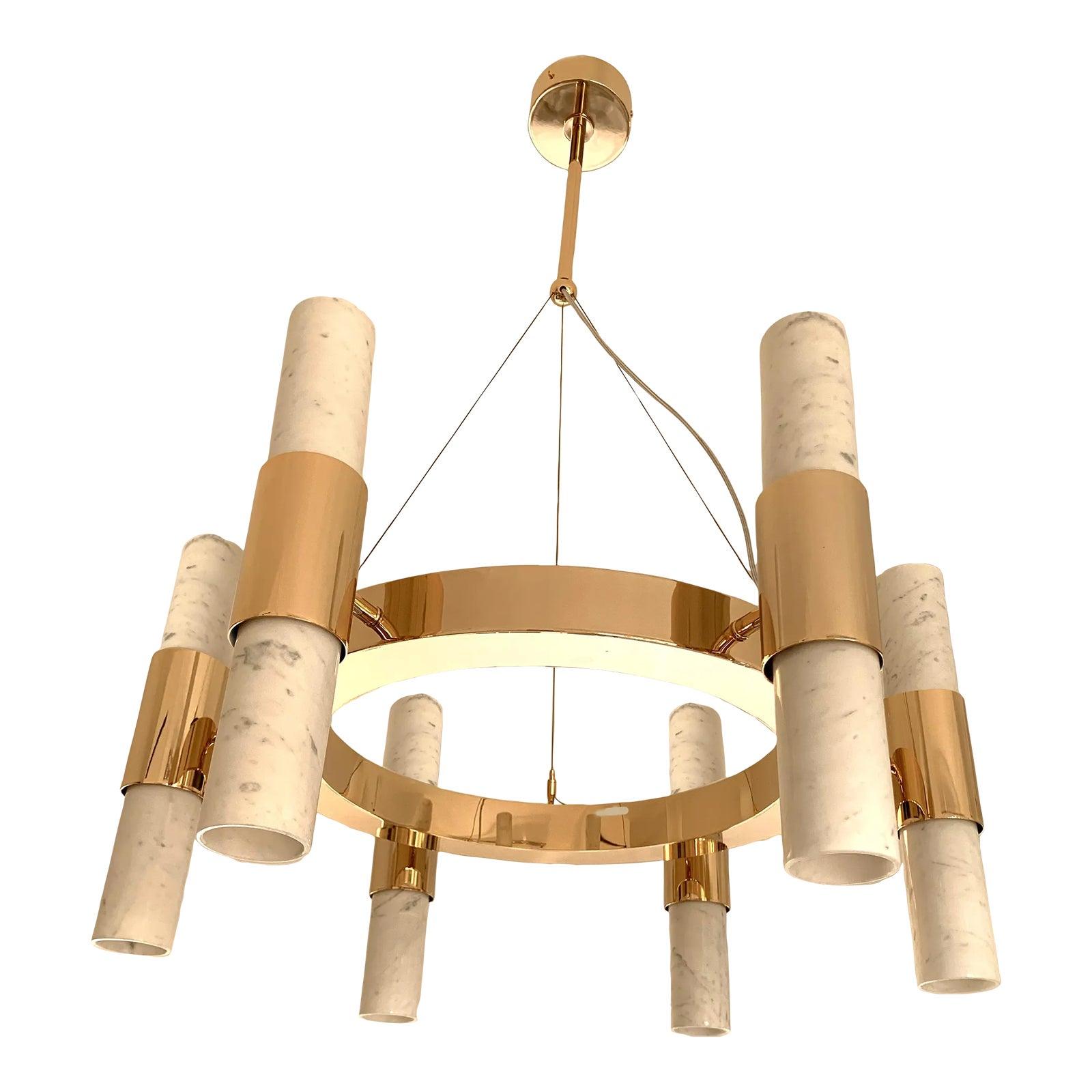 Marble chandelier photographed on a clean white studio background showcasing genuine natural stone and premium metal detailing.