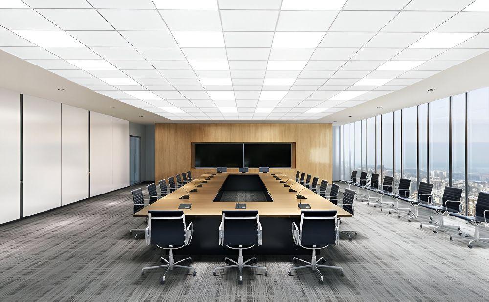 Recessed low-glare panel lighting creating a comfortable visual environment in a contemporary office meeting space