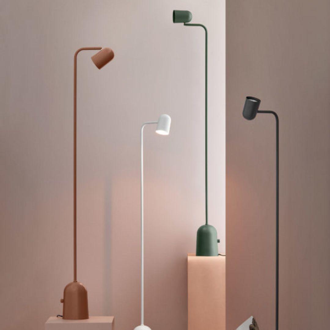 Collection of minimalist floor lamps featuring clean geometric forms and premium decorative finishes.