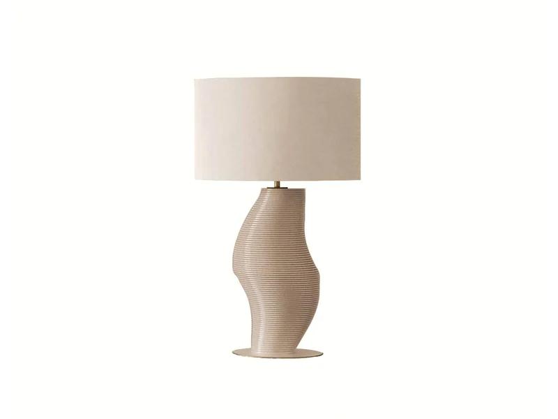 Bedside table lamp photographed on a clean white background showcasing elegant proportions and premium materials.