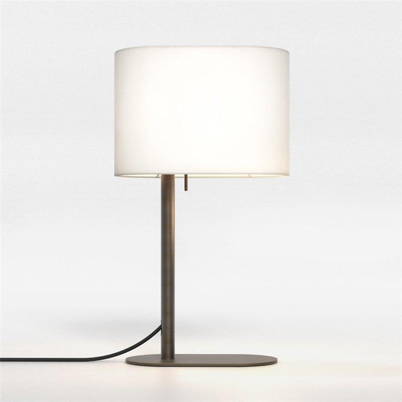 Front view of a bedside table lamp highlighting refined detailing and warm contemporary styling.
