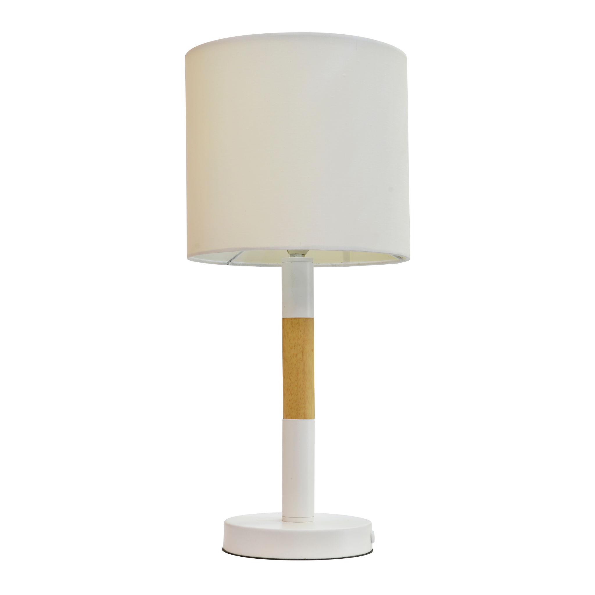 Bedside table lamp photographed on a clean white background showcasing elegant proportions and premium materials.