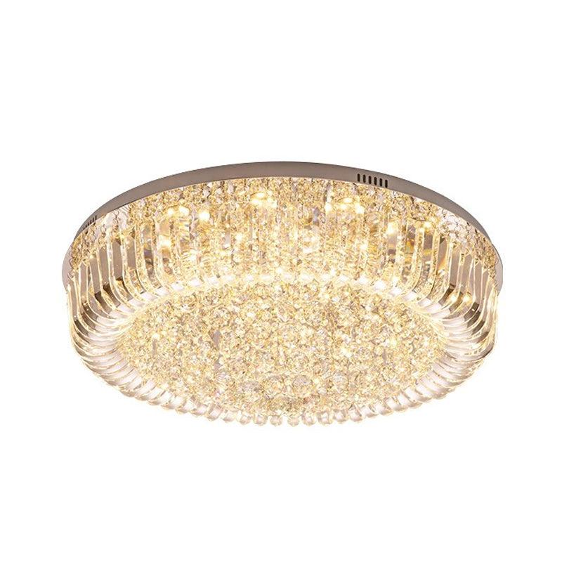 Crystal flush mount ceiling light with layered clear crystal elements on a white background