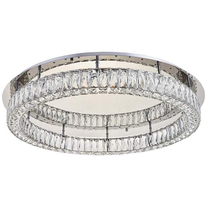 Crystal flush mount ceiling light with layered clear crystal elements on a white background