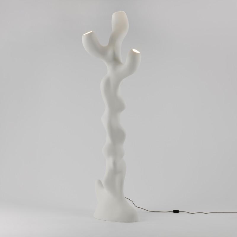 Front view of a sculptural floor lamp highlighting abstract geometry, elegant proportions and refined architectural detailing.