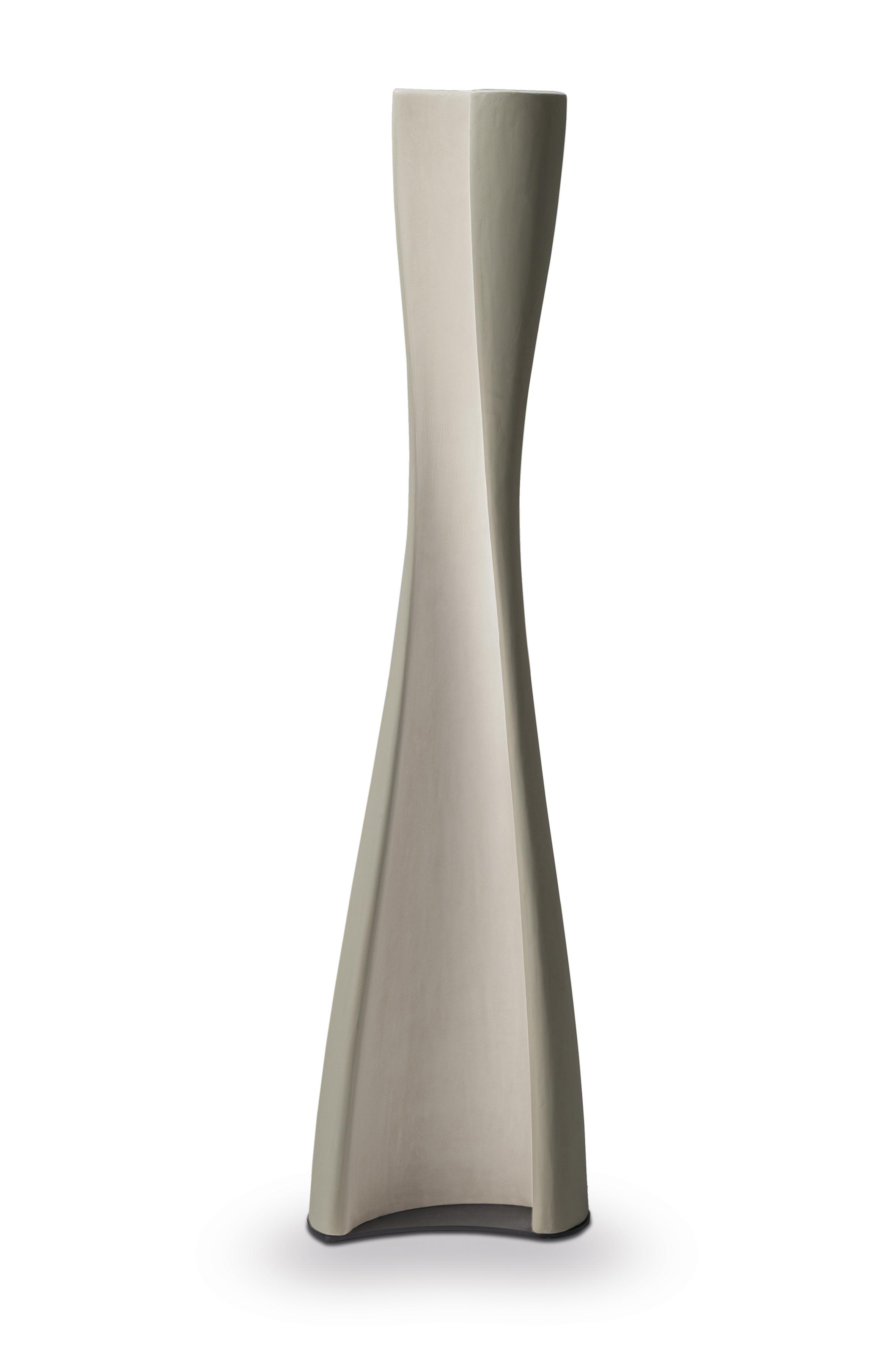 Sculptural floor lamp photographed on a clean white background showcasing its expressive artistic form and premium craftsmanship.