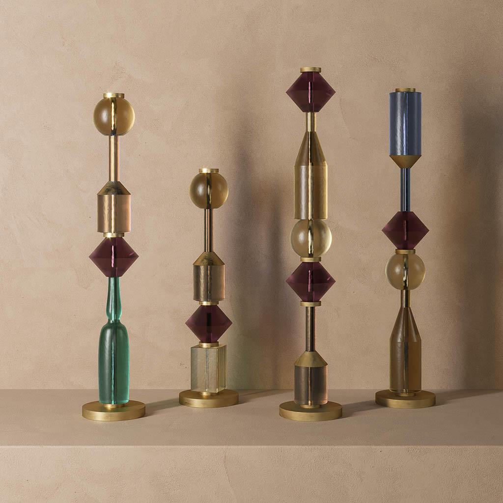 Collection of sculptural floor lamps featuring contemporary artistic forms and premium decorative finishes.