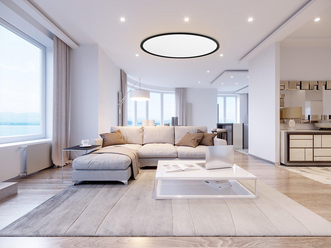 Minimal ceiling-mounted decorative light integrated into a contemporary hospitality interior providing soft ambient illumination.