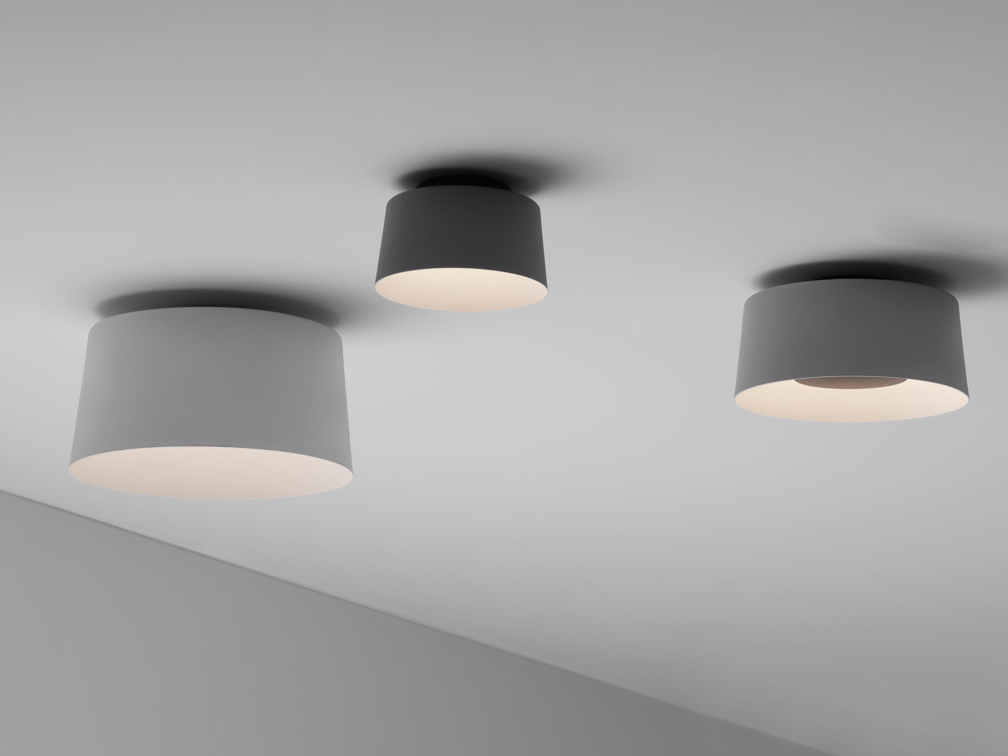 Collection of minimalist ceiling lights designed for contemporary residential and hospitality interiors.