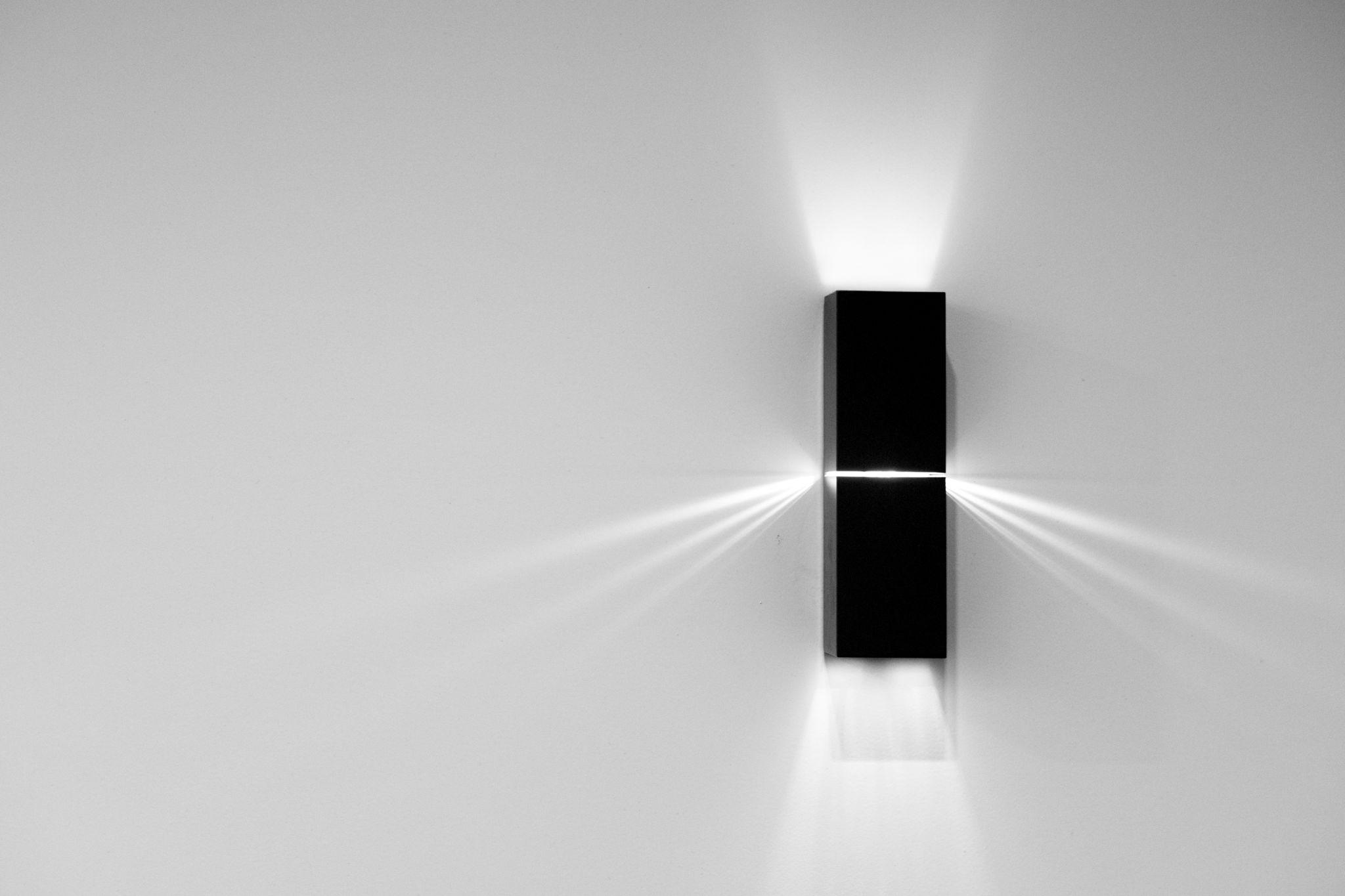Front view of a contemporary architectural wall lamp.